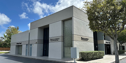 modern office building exterior under blue sky